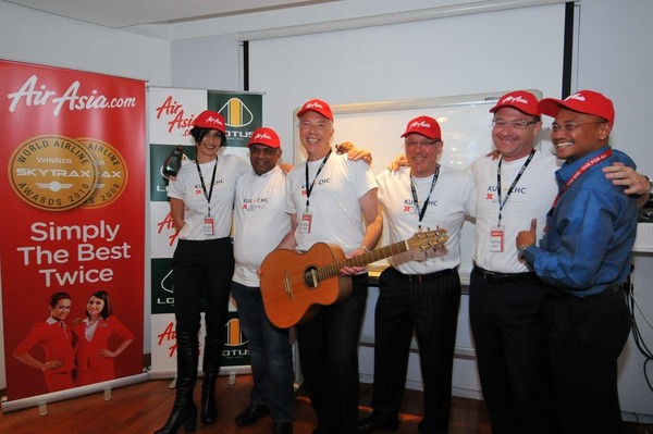 Celebration of representatives from Christchurch, New Zealand and Air Asia X after signing the deal